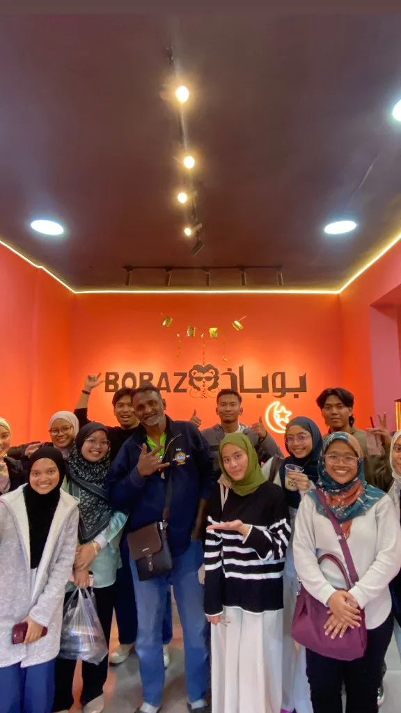 Bobaz community gathering inside the café